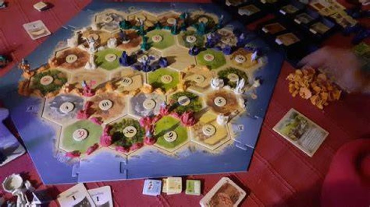 Can you trade when its not your turn in Catan?